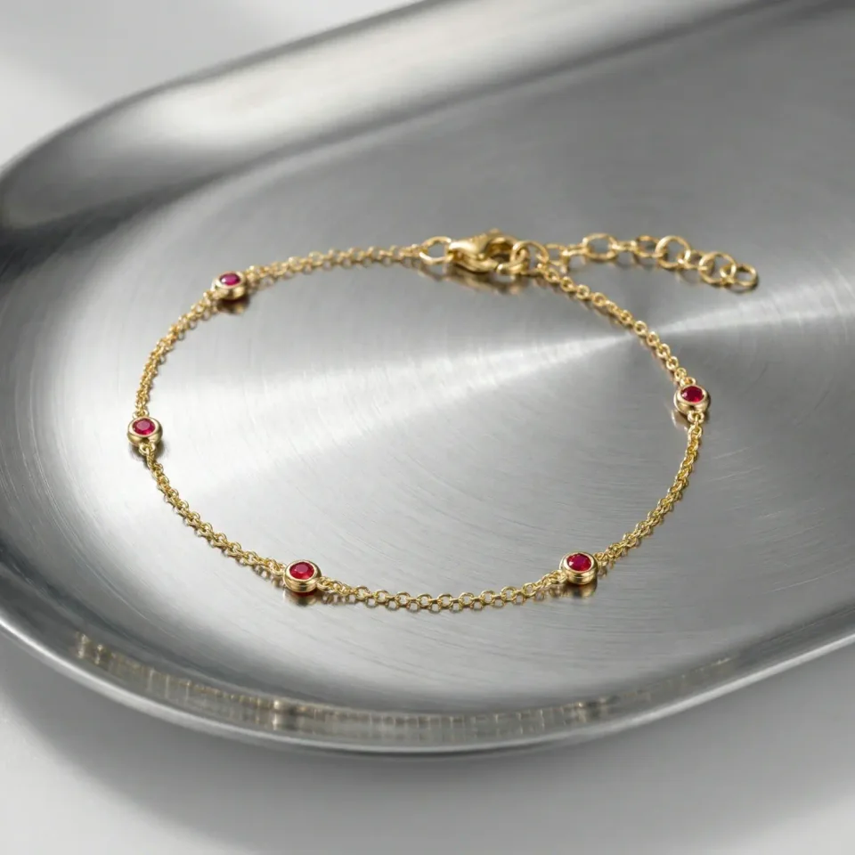 Jewelry lifestyle image: bezel ruby chain macro