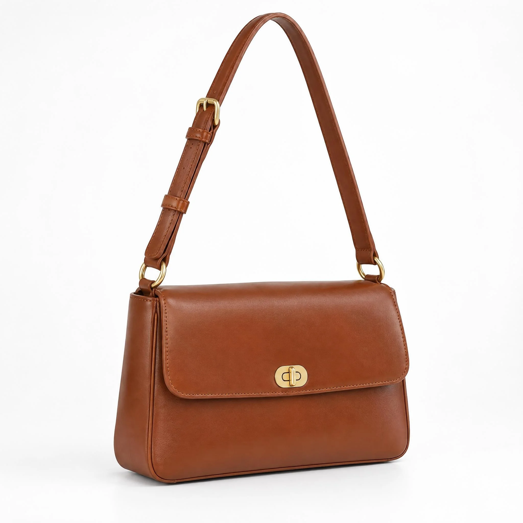 Brown leather shoulder bag at a three-quarter angle on a white background