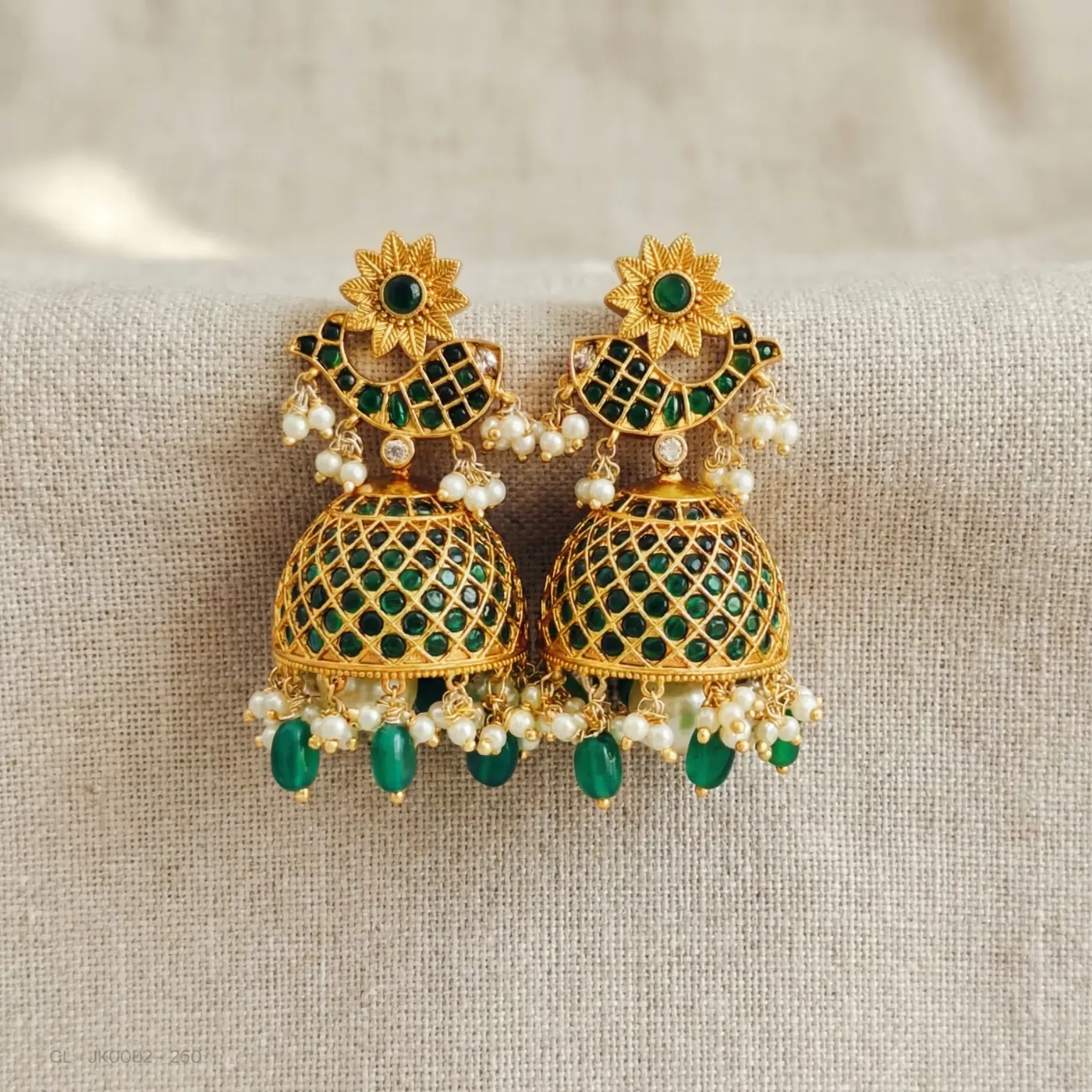 Jewelry lifestyle image: green jhumkas overhead