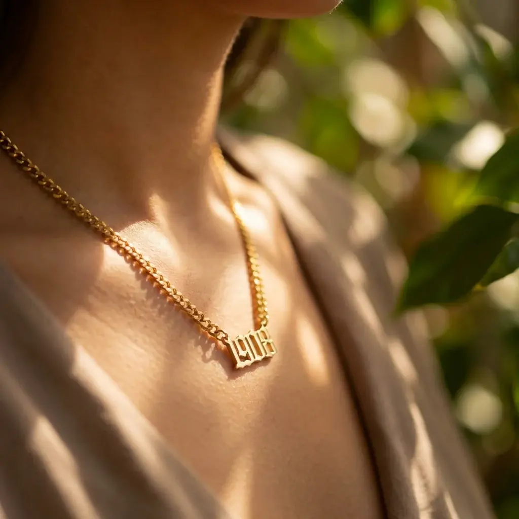 Jewelry lifestyle image: nameplate necklace golden hour